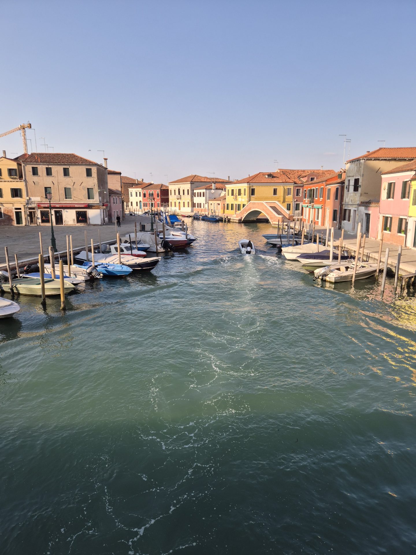 Canal and historic buildings on Murano, Venice
